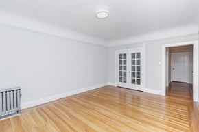 San Francisco apartment for rent - A room with a white door and a window with a white frame.
