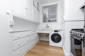 San Francisco apartment for rent - A white laundry room with a washer and dryer.