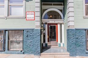 San Francisco apartment for rent - A building with a sign that says "Rent Now" on it.
