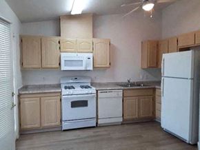 Oakley apartment for rent - Image of refrigerator, stove, microwave, sink, cabinets, and dishwasher