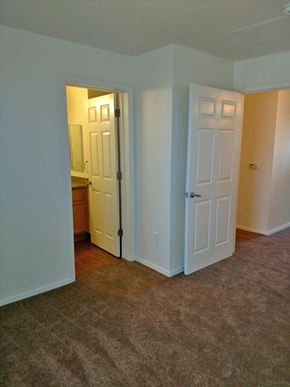 Salinas apartment for rent - First bedroom facing entrance to hall and bathroom.  Flooring is carpet.