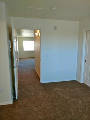Salinas apartment for rent - Second bedroom showing closet door, looking out into the hall.  Flooring is carpet.