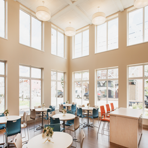 Pittsburgh apartment for rent - a dining room with tables and chairs and large windows