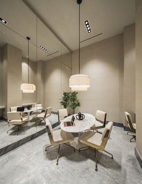 Jersey City apartment for rent - A modern dining room with a round table and chairs.