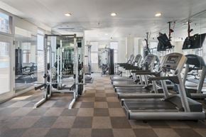 Jersey City apartment for rent - A gym with treadmills, weights, and other exercise equipment.
