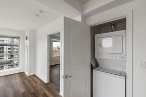 Boston apartment for rent - A white oven and dishwasher are built into a wall in a kitchen.