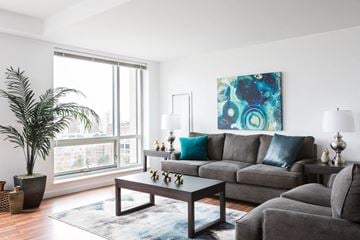 Boston apartment for rent - a living room with a couch and a coffee table