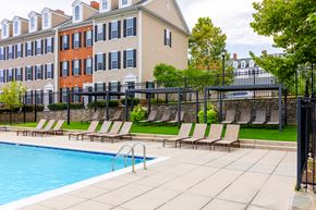 Elkridge townhouse for rent - our apartments have a large pool and lounge chairs