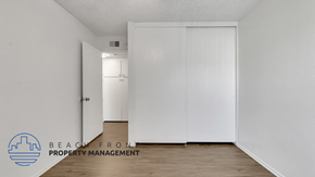 El Monte apartment for rent - a bedroom with white walls and wood floors and a white closet