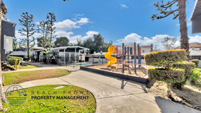 El Monte apartment for rent - a playground with a yellow slide at the beach town property management
