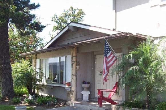 Anaheim apartment for rent - a small house with a toilet and an american flag