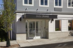 North Bergen apartment for rent - the front of a building with a door and a sign that reads 264 grand