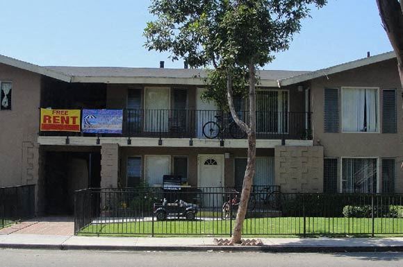 Garden Grove apartment for rent - a building with a motorcycle parked in front of it