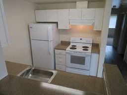 Marysville apartment for rent - a kitchen with a stove refrigerator and a sink