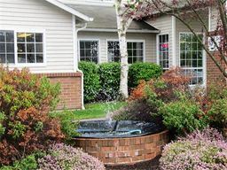 Marysville apartment for rent - a fountain in the front yard of a house