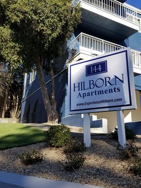 Vallejo apartment for rent - a sign for the hilborn apartments in front of a building