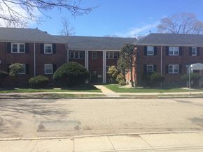 Quincy apartment for rent - an apartment building with a street in front of it