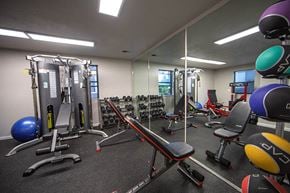 Salinas apartment for rent - a gym with weights and other equipment in a building