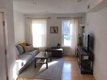 Philadelphia apartment for rent - a living room with a couch and a television