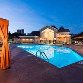 South Windsor apartment for rent - a swimming pool is lit up at night