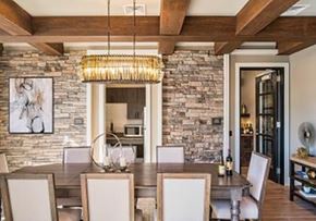South Windsor apartment for rent - a dining room with a table and chairs and a brick wall