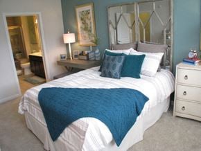 South Windsor apartment for rent - a blue and white bedroom with a bed and a bathroom