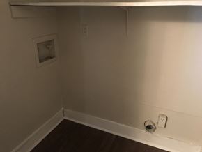 Birmingham apartment for rent - A small square window on a wall.