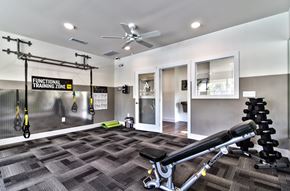Ellisville apartment for rent - fitness center with equipment at Aventura at Towne Centre, Missouri