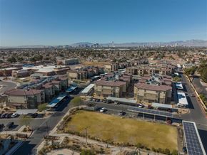 Las Vegas apartment for rent - an aerial view of the city with residential buildings and a solar