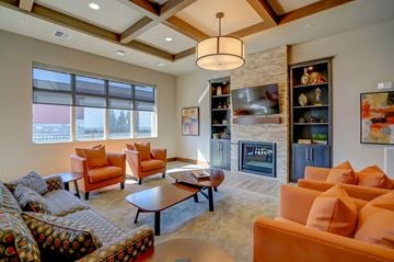 Middleton apartment for rent - a living room with couches and chairs and a fireplace
