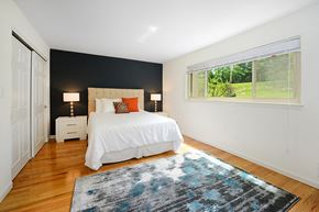 Springfield apartment for rent - a bedroom with a bed and a window