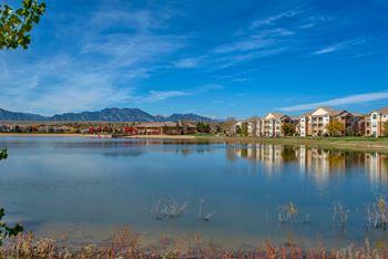 13 Acre lake with large beach and dock