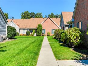 Bowling Green apartment for rent - a sidewalk in front of a row of houses
