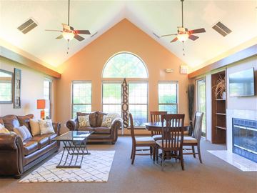 Bowling Green apartment for rent - a living room with couches and a table and a fireplace