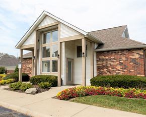 Hilliard apartment for rent - a small brick house with a sidewalk in front of it