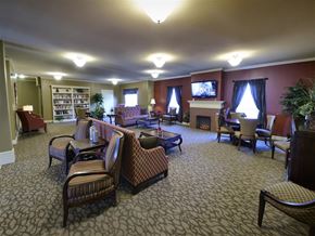 Kent apartment for rent - A living room with a fireplace and a television.