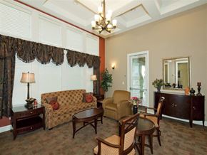 Fort Worth apartment for rent - A living room with a couch, chairs, and a table.