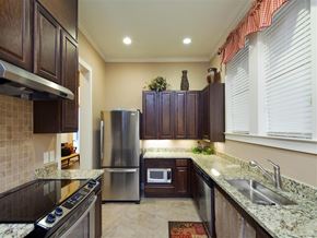 Fort Worth apartment for rent - A kitchen with granite countertops and stainless steel appliances.