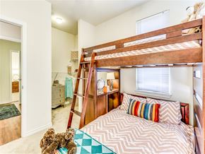 San Antonio apartment for rent - A bedroom with a bunk bed and a teddy bear on the floor.