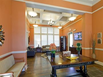 Laredo apartment for rent - A living room with a wooden table and a sofa.