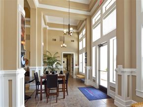 Fort Worth apartment for rent - A dining room with a table set for six.