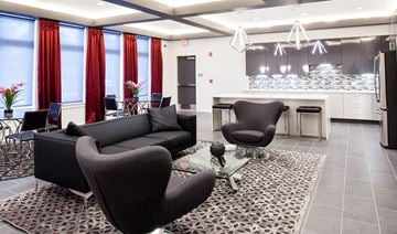 Newark apartment for rent - a living room with couches and chairs and a kitchen