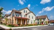 Flemington apartment for rent - a row of town homes with a car parked in front of them