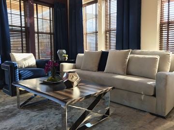 Flemington apartment for rent - a living room with white couches and a coffee table