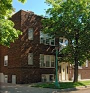 St Paul apartment for rent - a brick building with a tree in front of it