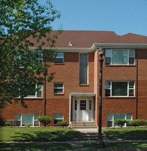 St Paul apartment for rent - a red brick building with a white door