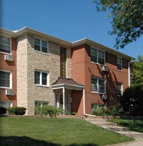 St Paul apartment for rent - a brick building with a lawn in front of it