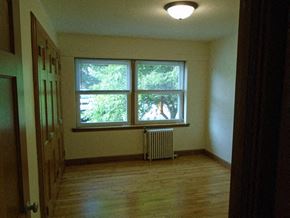 St Paul apartment for rent - an empty room with a window and a radiator