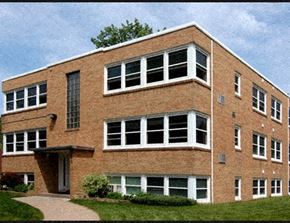 St Paul apartment for rent - a large brick building with a sidewalk in front of it