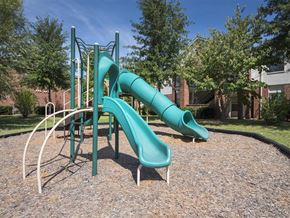 Fayetteville apartment for rent - a playground with a slide in a park
